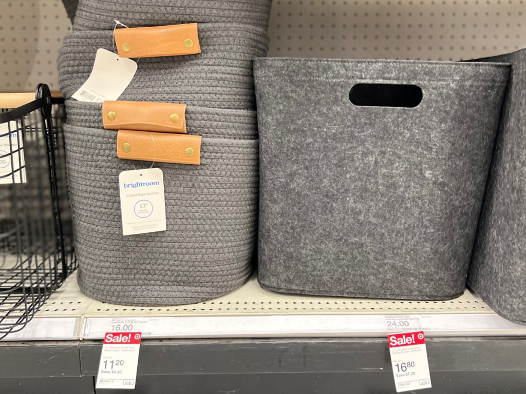 gray storage baskets on store shelf