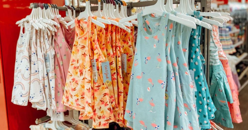 dresses on racks at store
