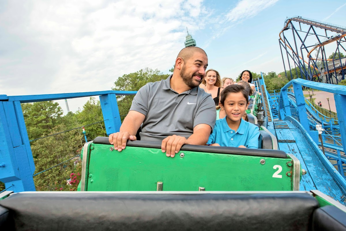 A boy and his father on a rollercoaster at Cedar Point Amusement Park in Sandusky, Ohio