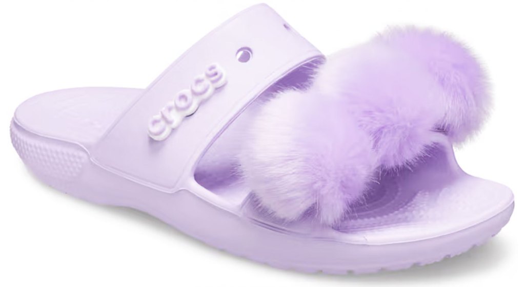 purple crocs sandal with pom poms