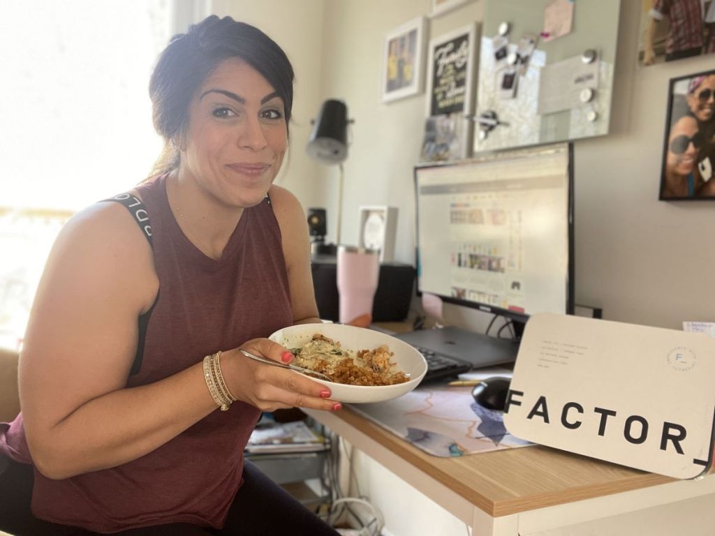 woman holding a Factor meal