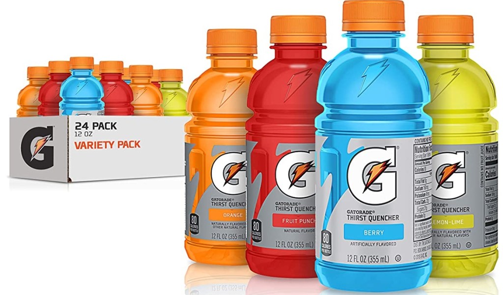 Four bottle of Gatorade with a case of Gatorade behind them