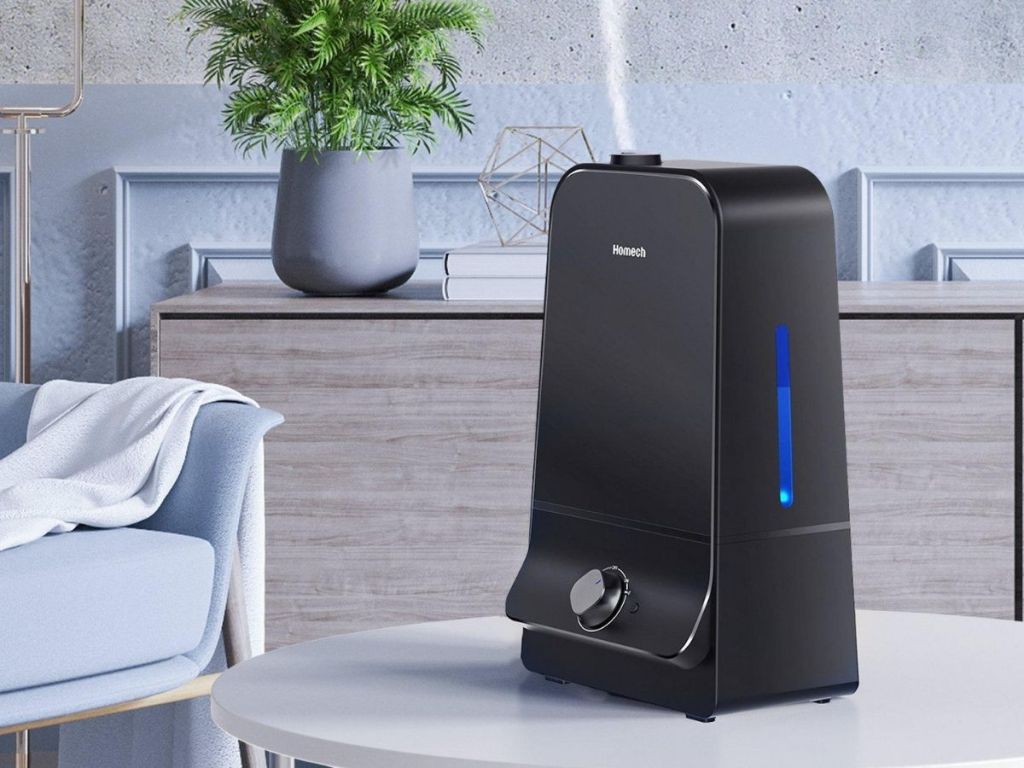 black Homech humidifier on table in living room