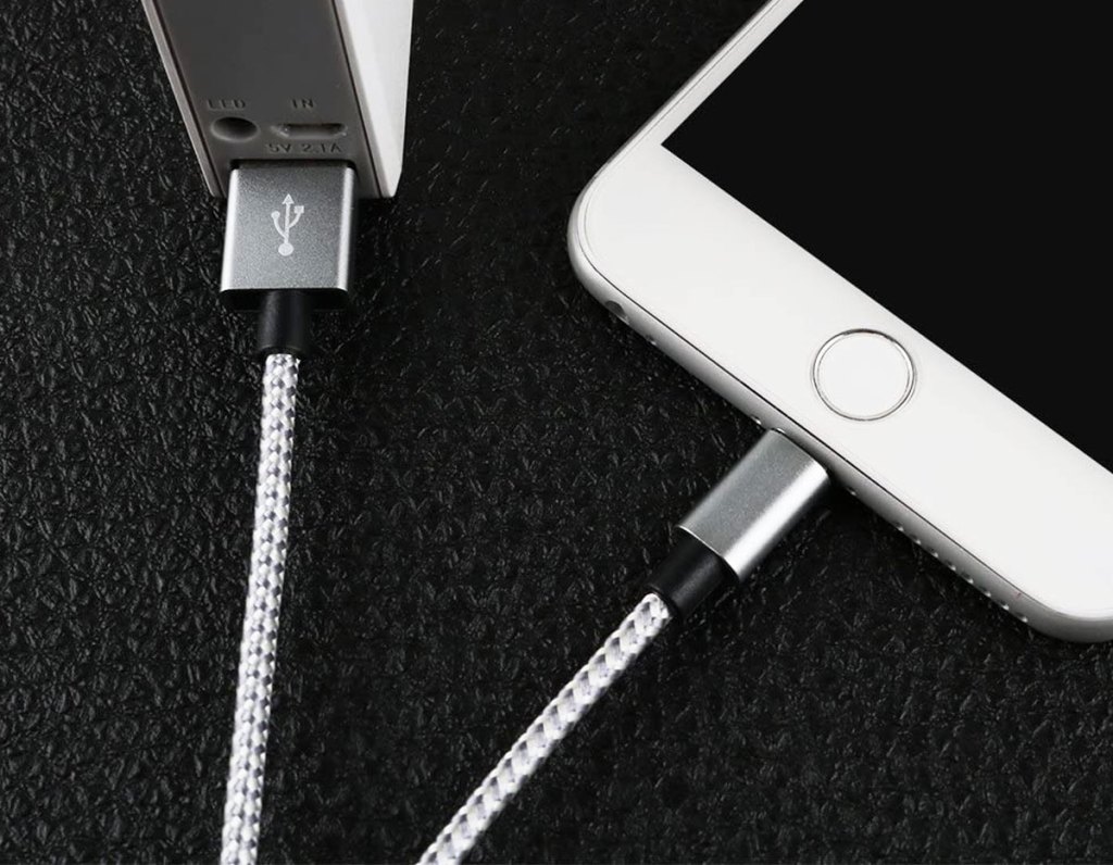 lightning cable plugged into power bank and iphone