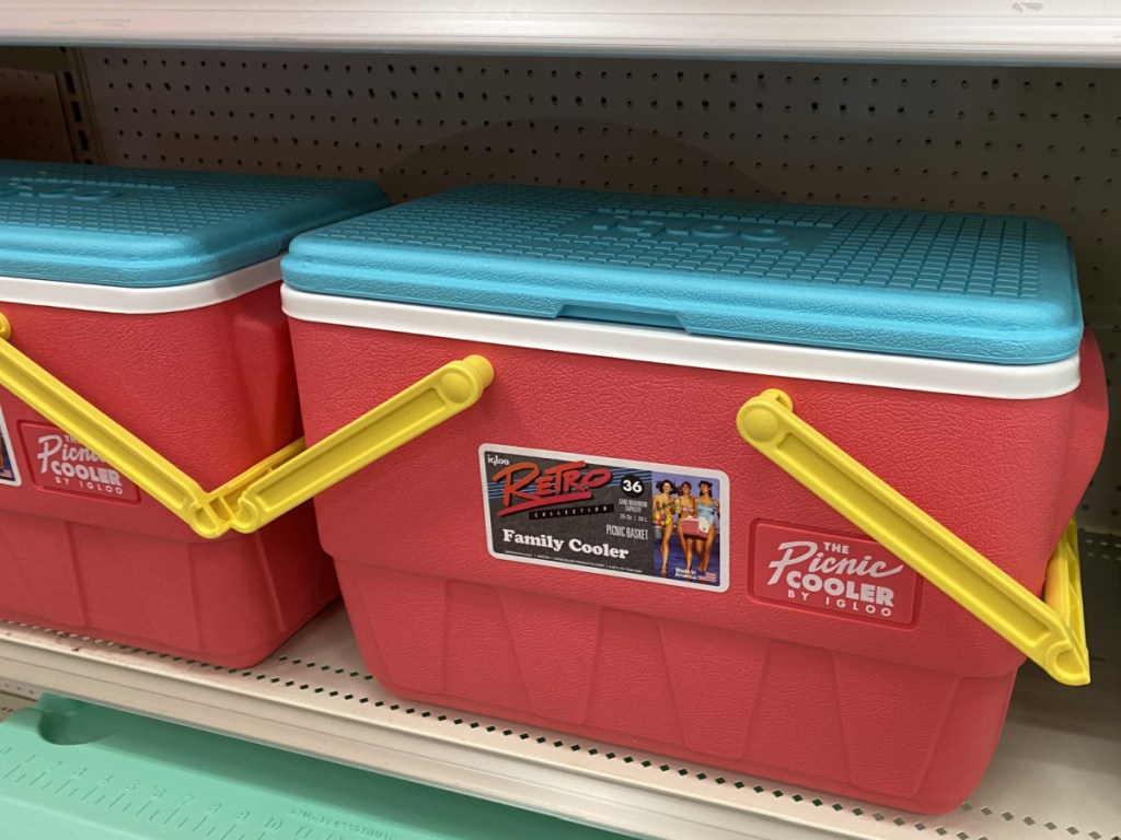 red picnic basket cooler on store shelf