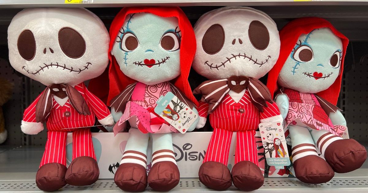 Jack and sally plush dolls on a store shelf in a walmart