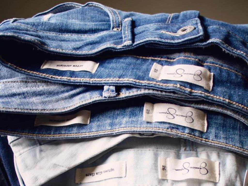 pile of Jessica Simpson Jeans 