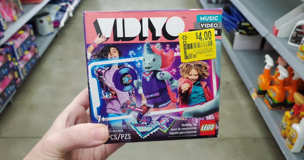 hand holding kids musical building toy in store