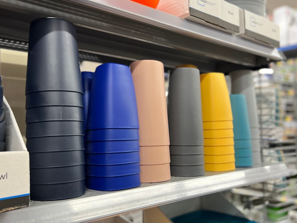 stacked plastic tumblers on store shelf