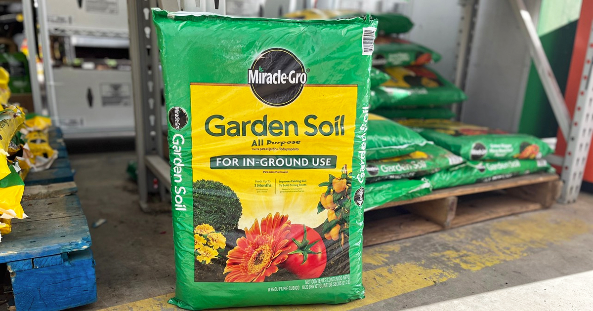 green and yellow bag of miracle gro garden soil