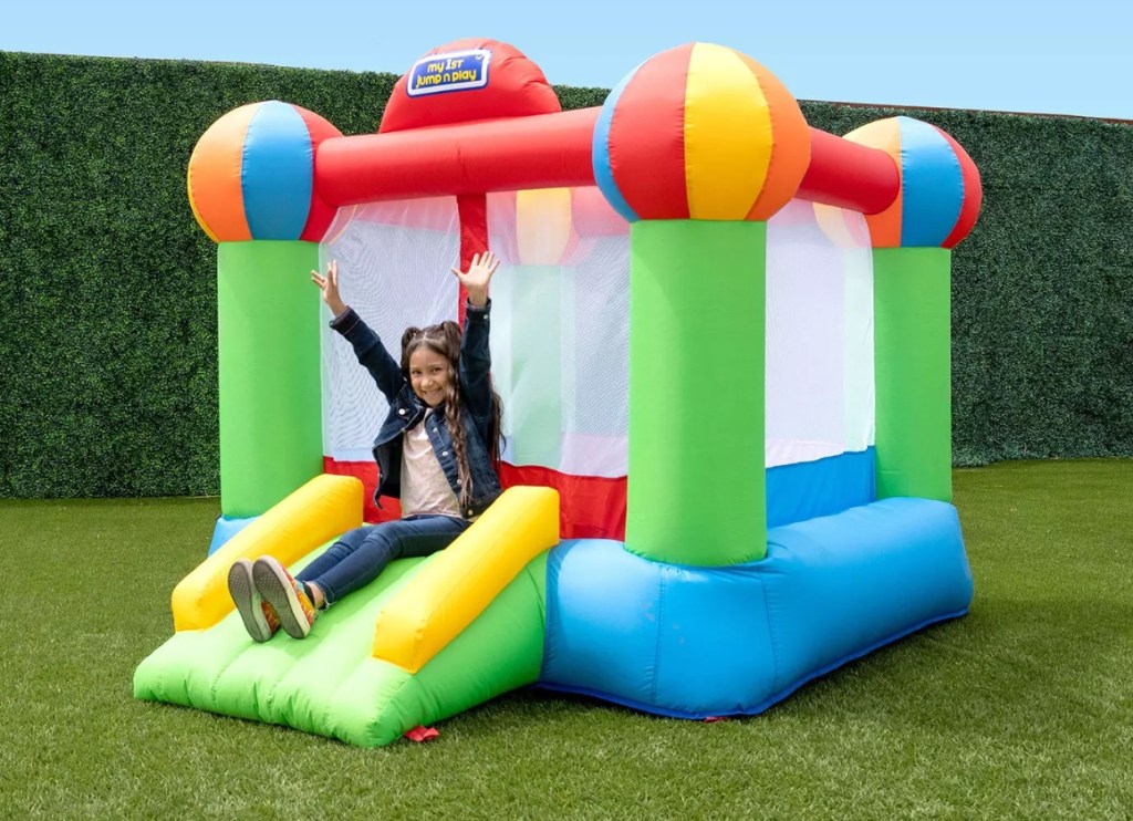 girl on an inflatable bouncer