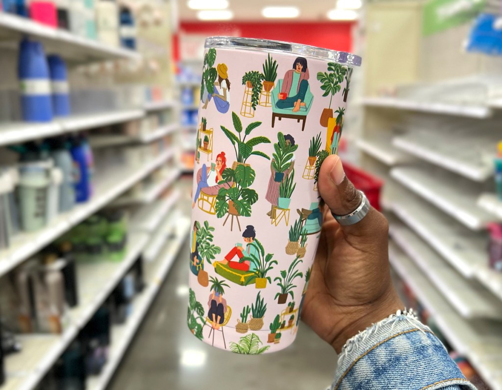 OCS Designs 17oz Stainless Steel Tumbler being held by a woman in Target