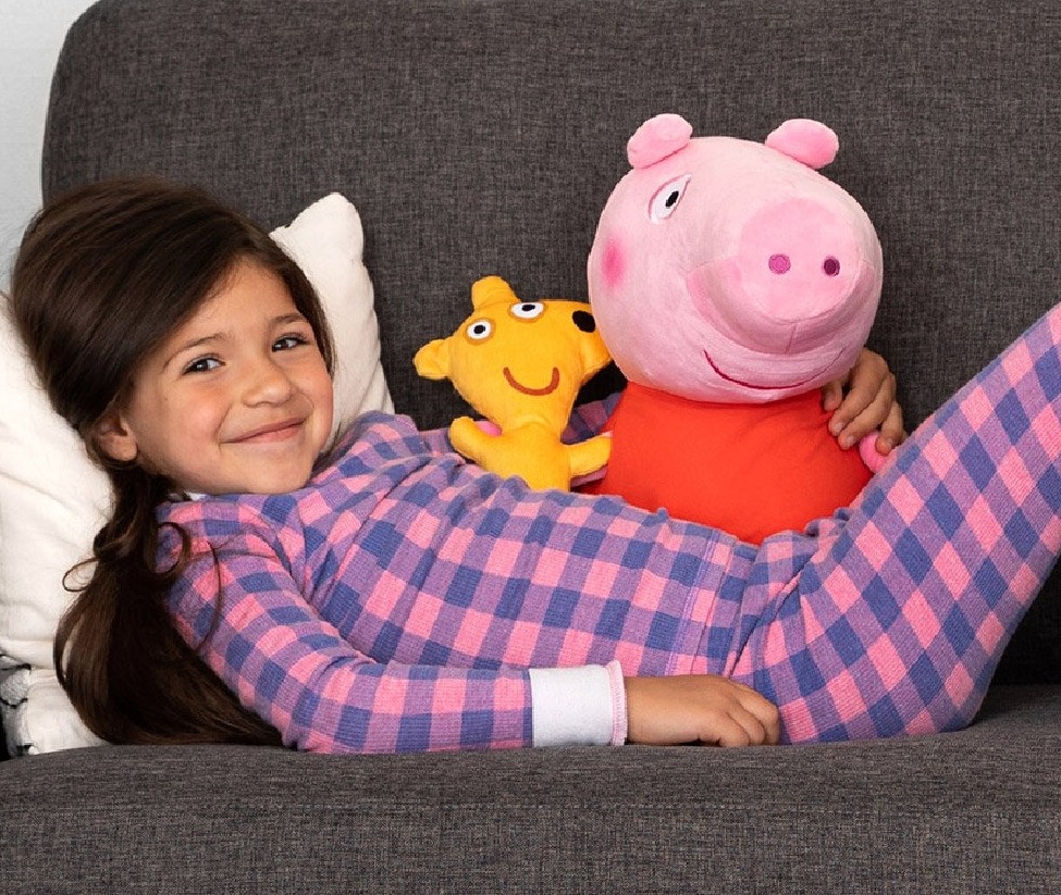 girl with a Peppa Pig plush