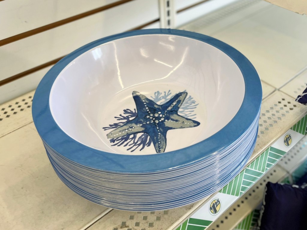 blue and white seashell bowls on store shelf