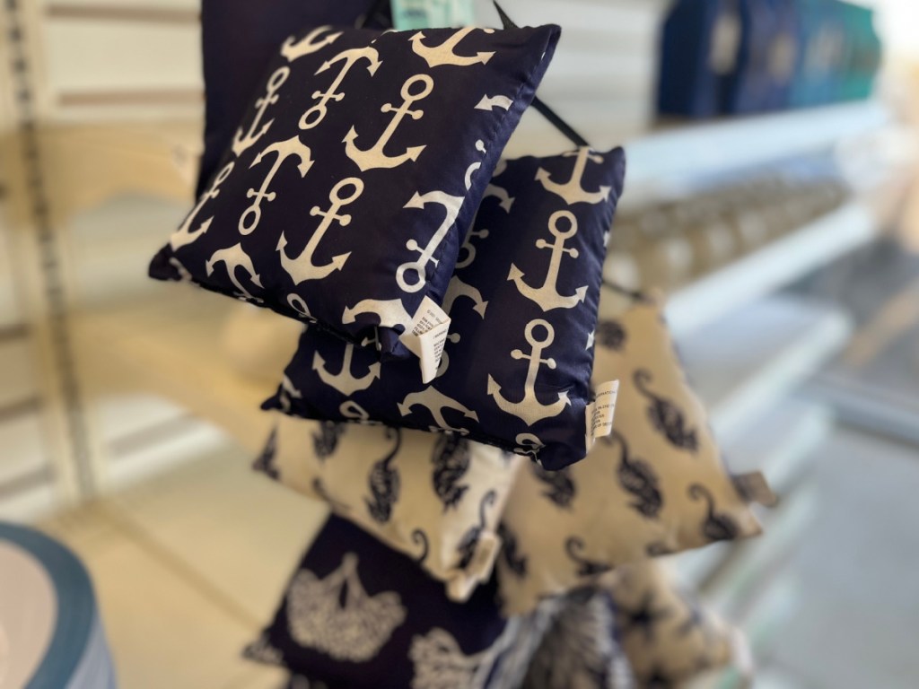 small blue and white anchor print pillows in store