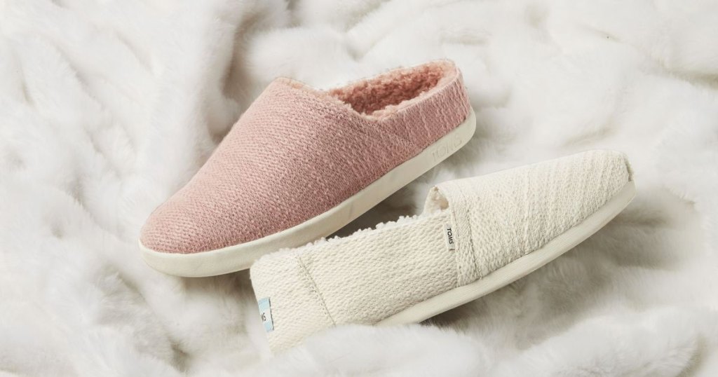 pairs of pink and white toms shoes