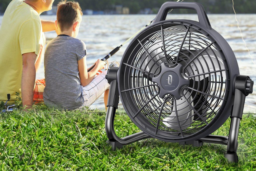 black fan in grass