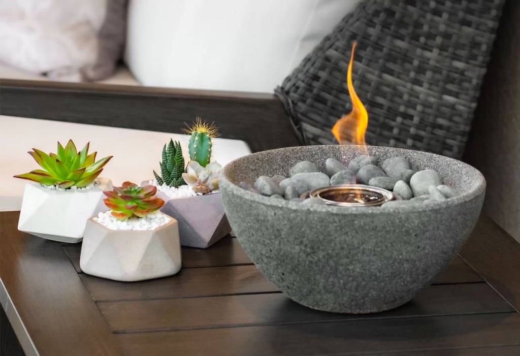 grey fire bowl on patio table