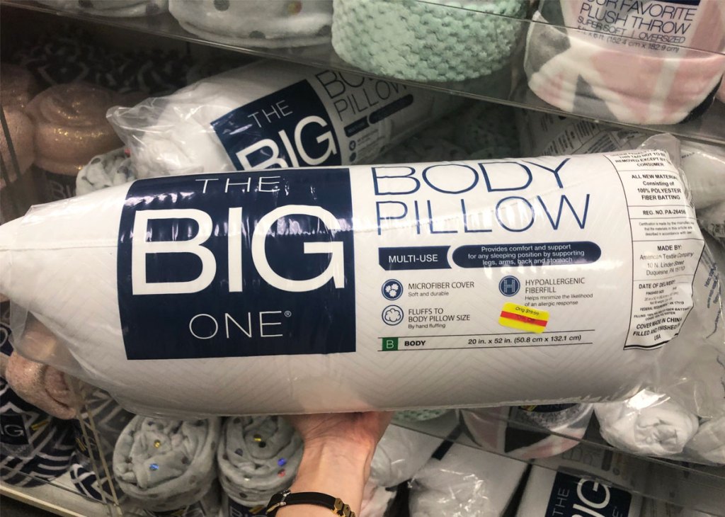 hand holding the big one body pillow