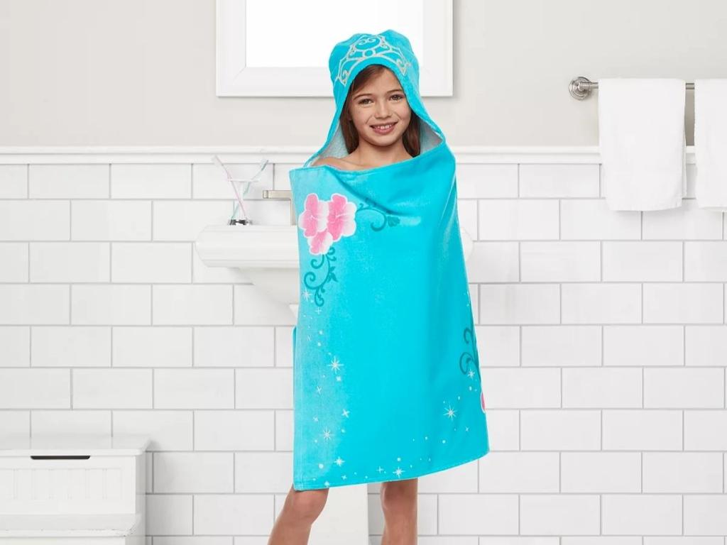 girl wearing the big one little mermaid hooded towel