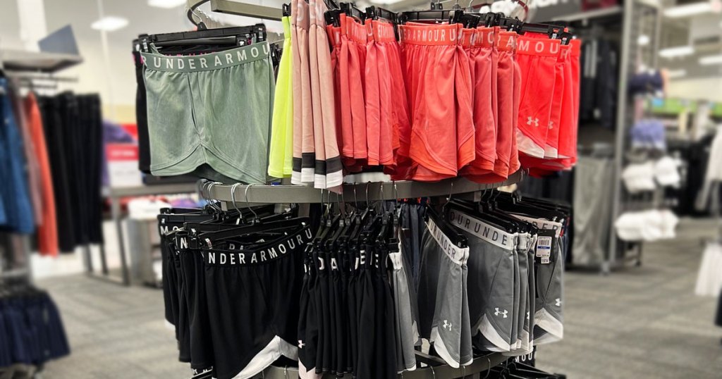 rack of under armour shorts in store