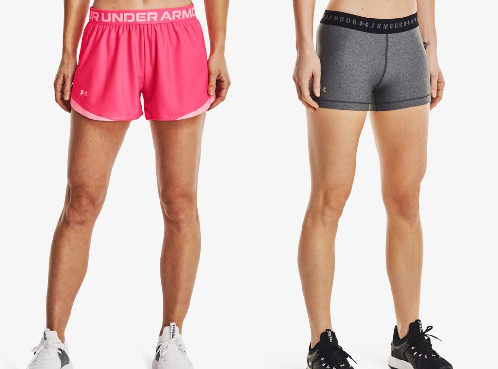 two women modeling under armour shorts