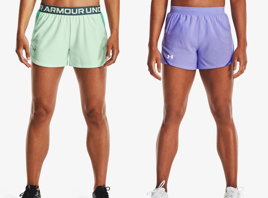 two women modeling under armour shorts
