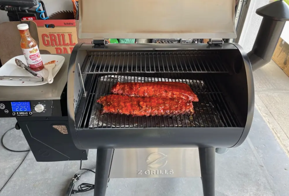 open grill with meat on it