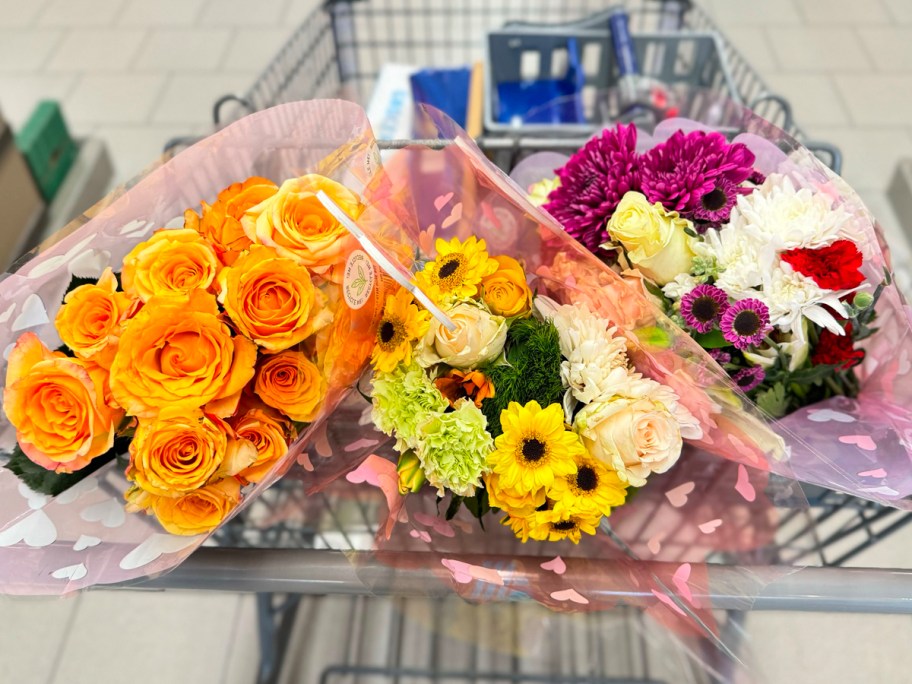 three flower bouquets in aldi shopping cart