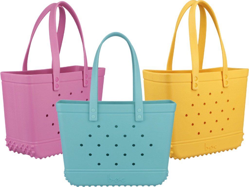 pink, blue, and yellow beach tote bags
