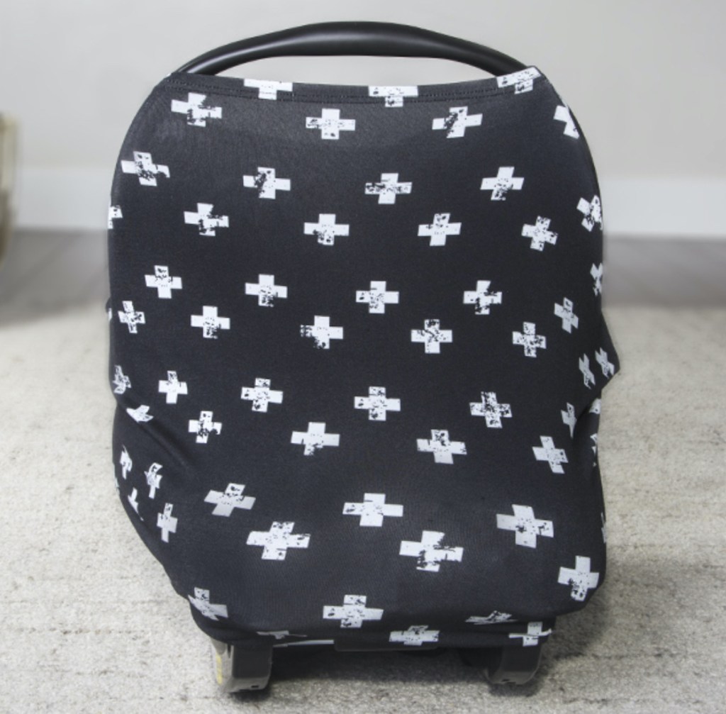 baby car seat with black and white modern plus sign car seat cover