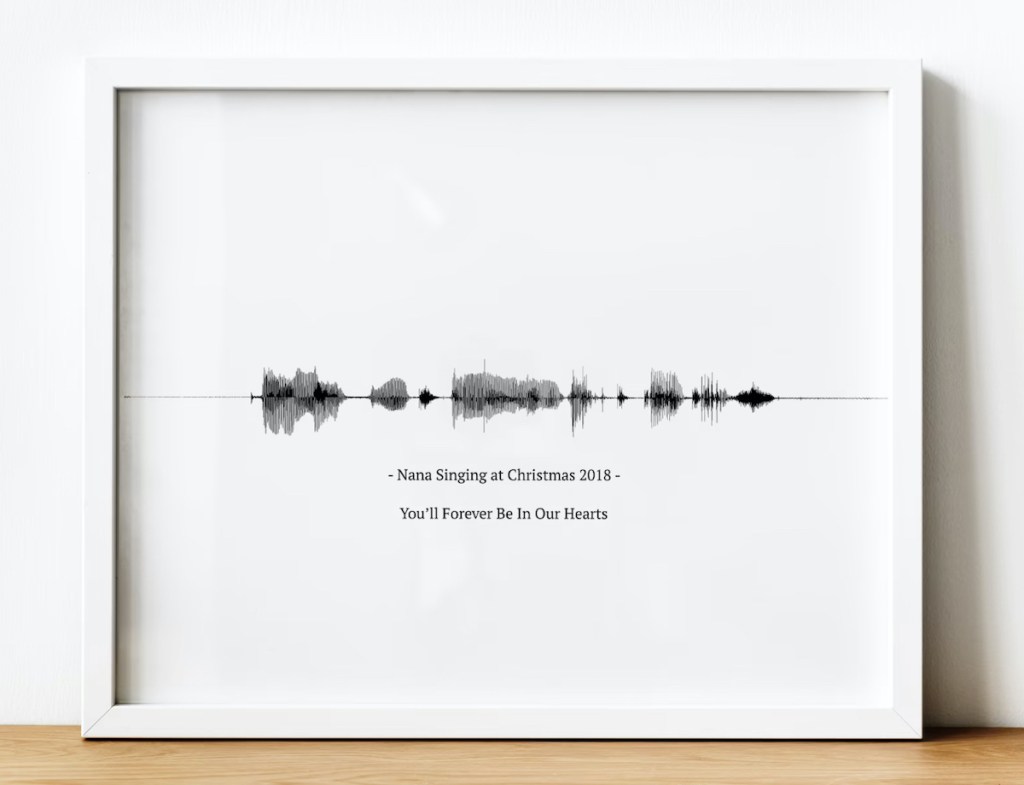 white picture frame with sympathy verbiage and sound wave