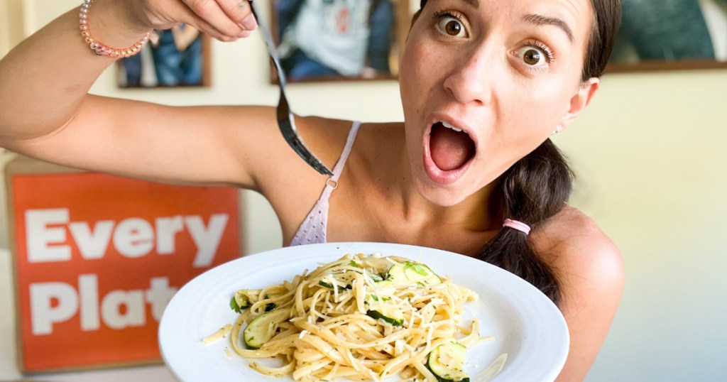 woman eating noodles