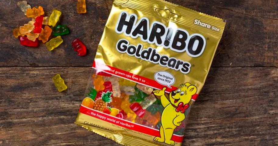 haribo goldbears candy bag on table with gummy bears laying on table