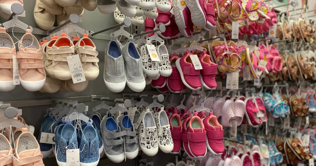 Kids shoes hanging on shelves at Target