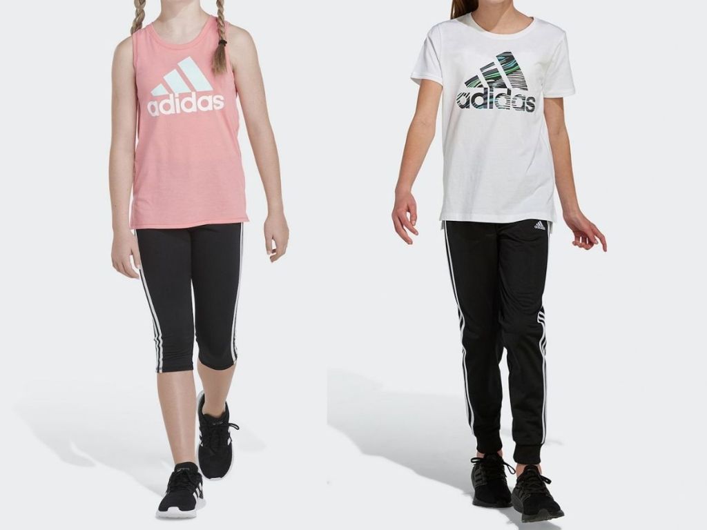 girls wearing pink adidas tee and white adidas tee
