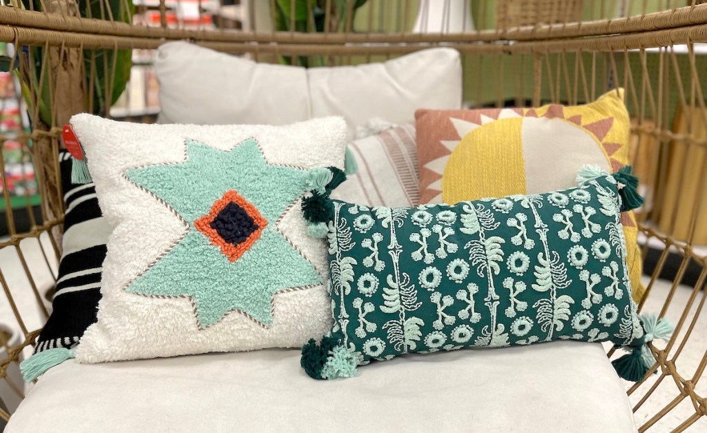 jungalow throw pillows on egg chair in target store