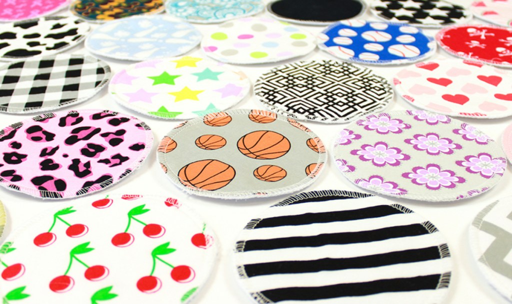 reusable breast pads with various on white table