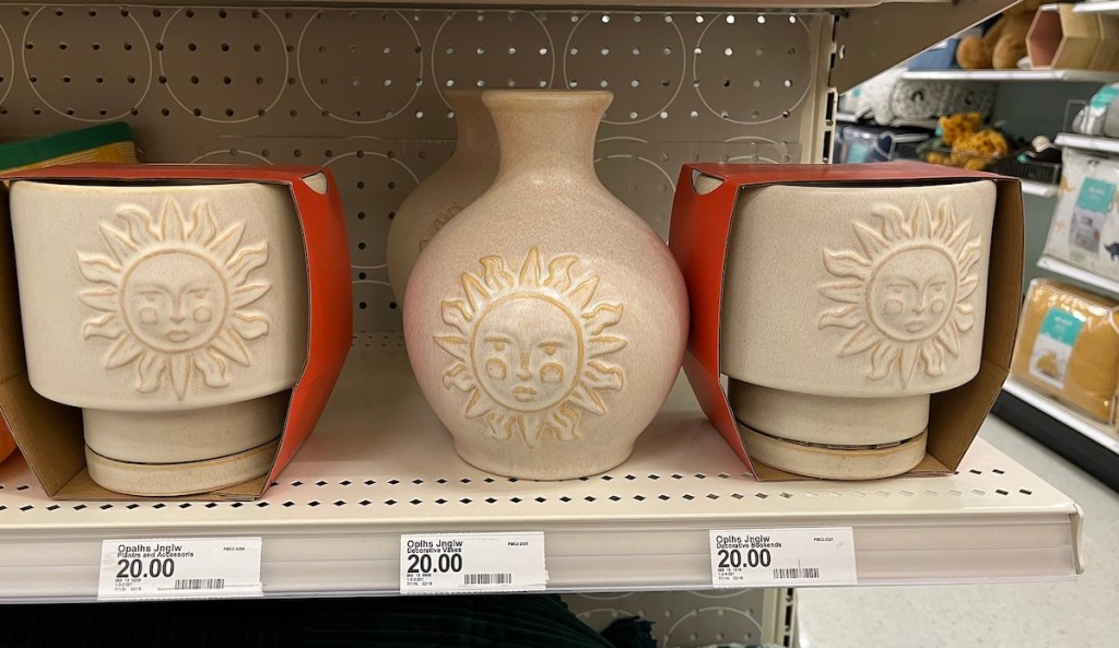 cream colored sunshine jungalow planters and vases on store shelf