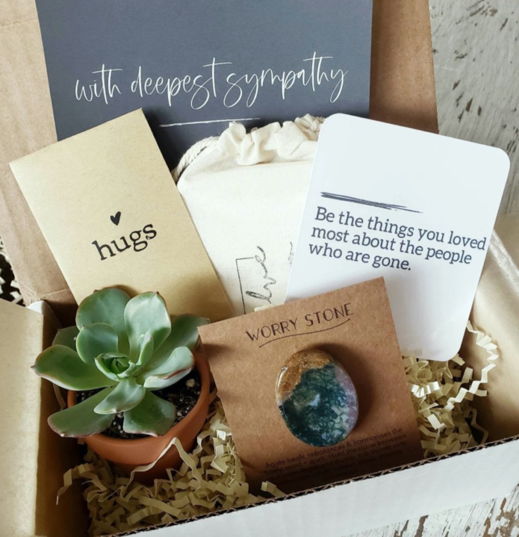 sympathy gifts in curated box with hugs seeds plant and worry stone