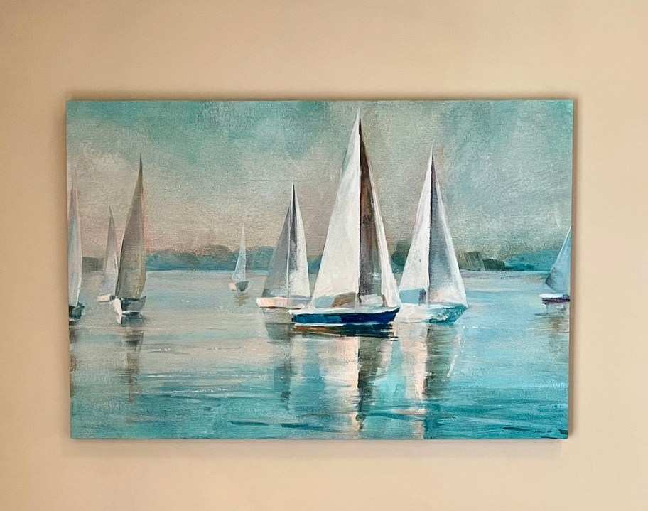 sailboat picture on gray wall