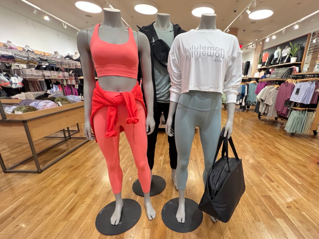 mannequins displaying clothes in a retail store