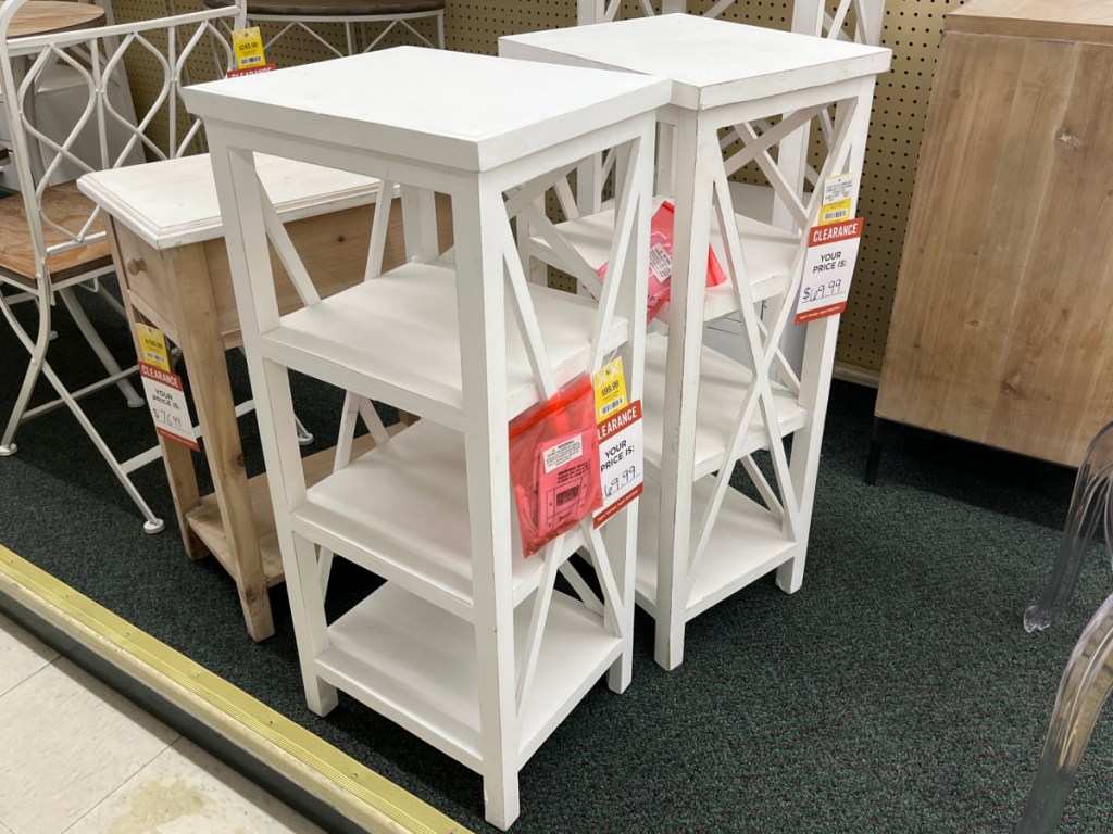 two white stands in store