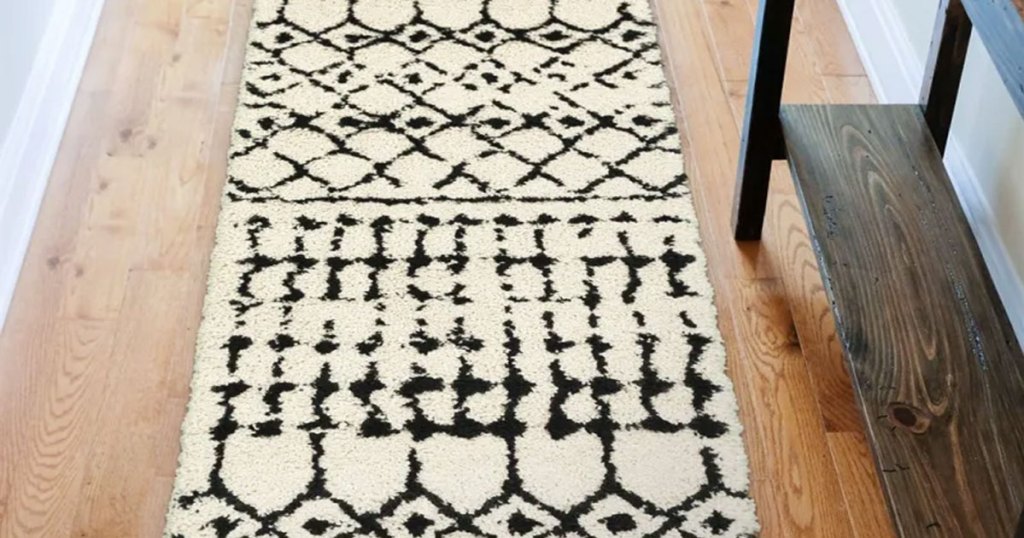 white and black printed runner rug