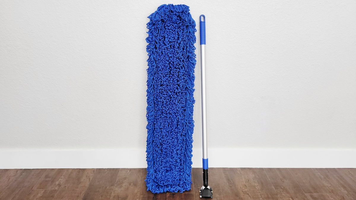 apline industries microfiber mop head and handle leaning up against a white wall