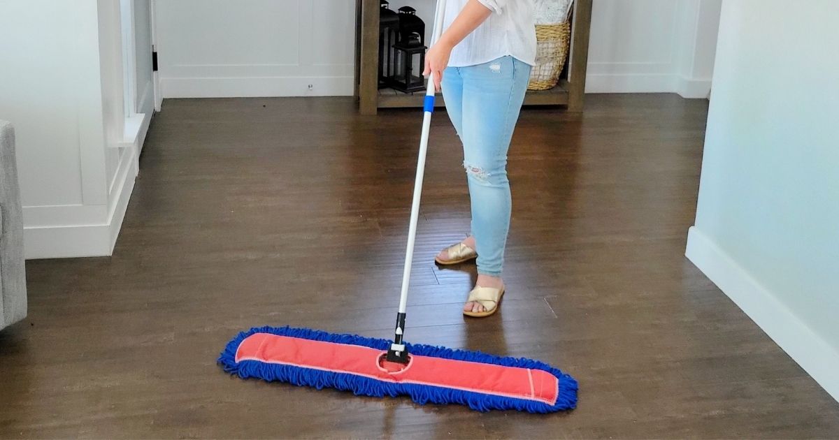 woman using an alpine industries microfiber mop to clean hardwood floors
