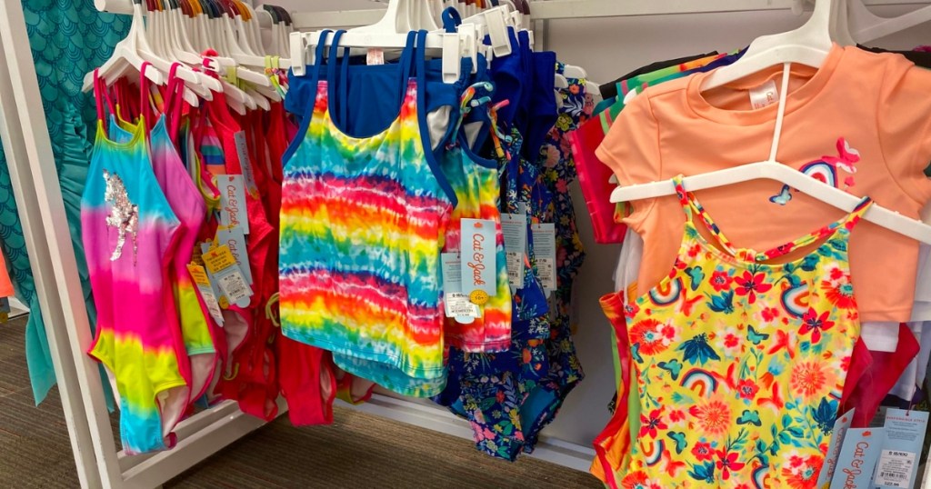 cat & jack girls swimsuits hanging in store
