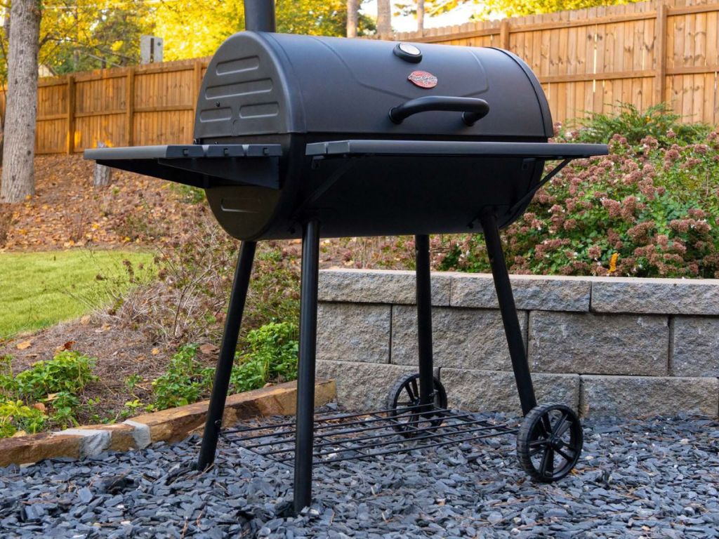 Char-Griller Super Pro Charcoal Grill on stones