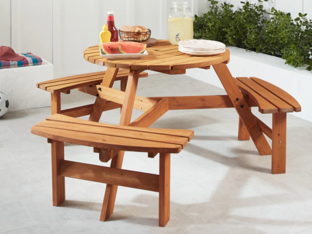 Circular Picnic Table outside in yard