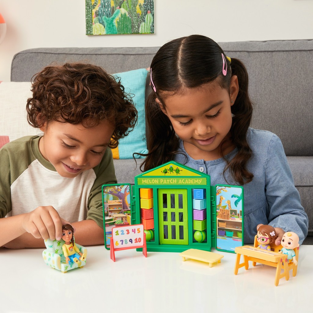 kids playing with cocomelon School playset